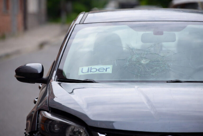 Rideshare accident Fairfax VA Uber Lyft vehicle on busy road