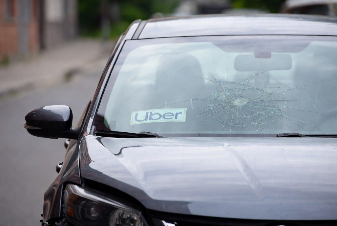 Rideshare accident Fairfax VA Uber Lyft vehicle on busy road